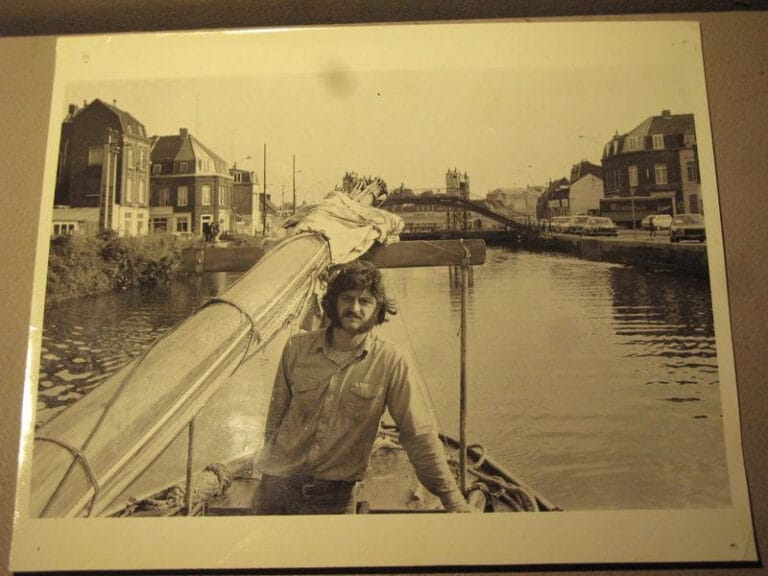 Paul Howard on a sailing boat in a canal
