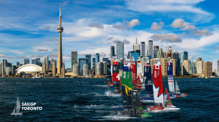 Catamarans racing past the CN Tower