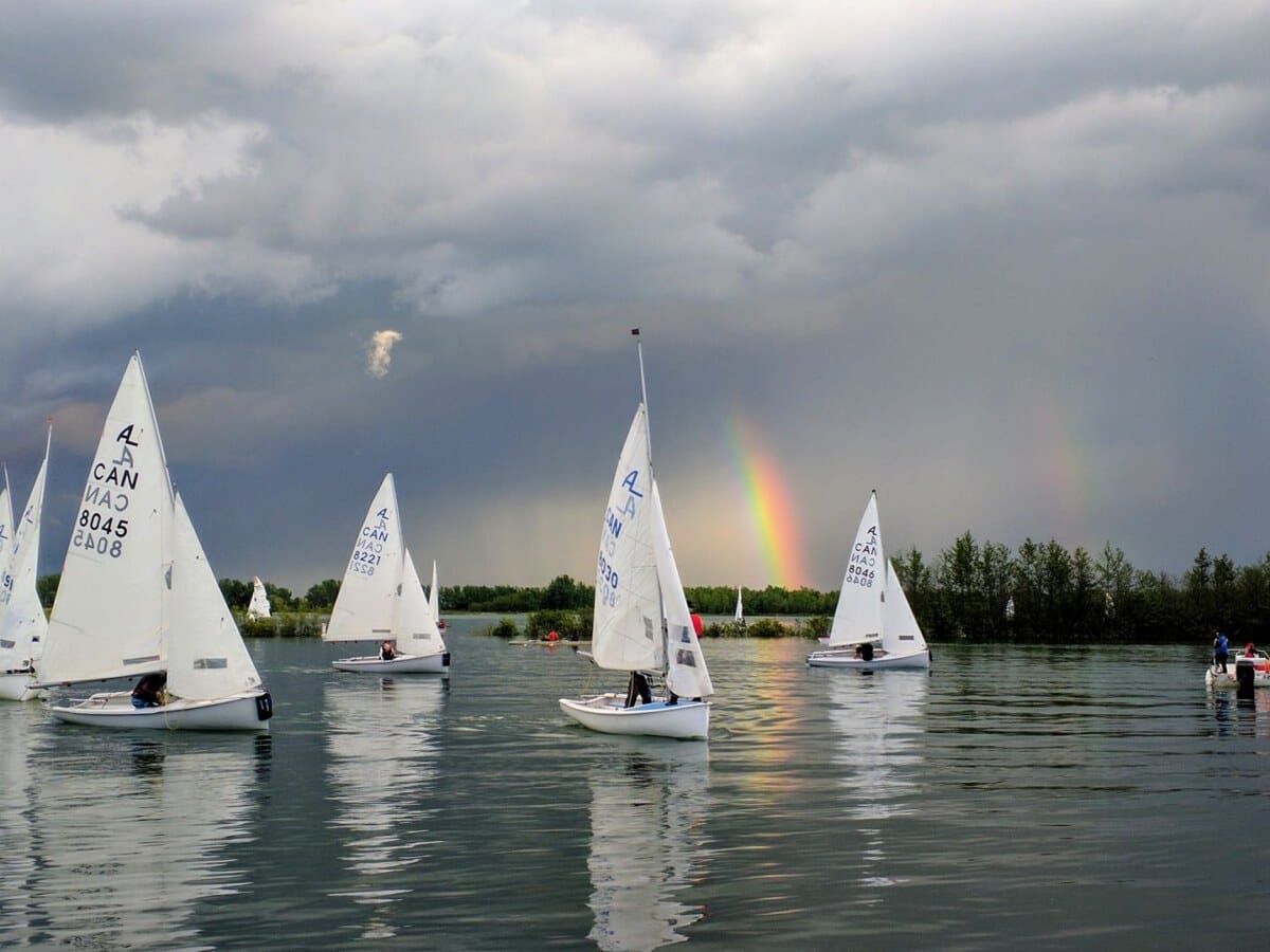 Sailboats with rainbow beyond