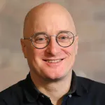 Bald man smiling